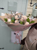 Rose and wax flower bouquet (all pink)