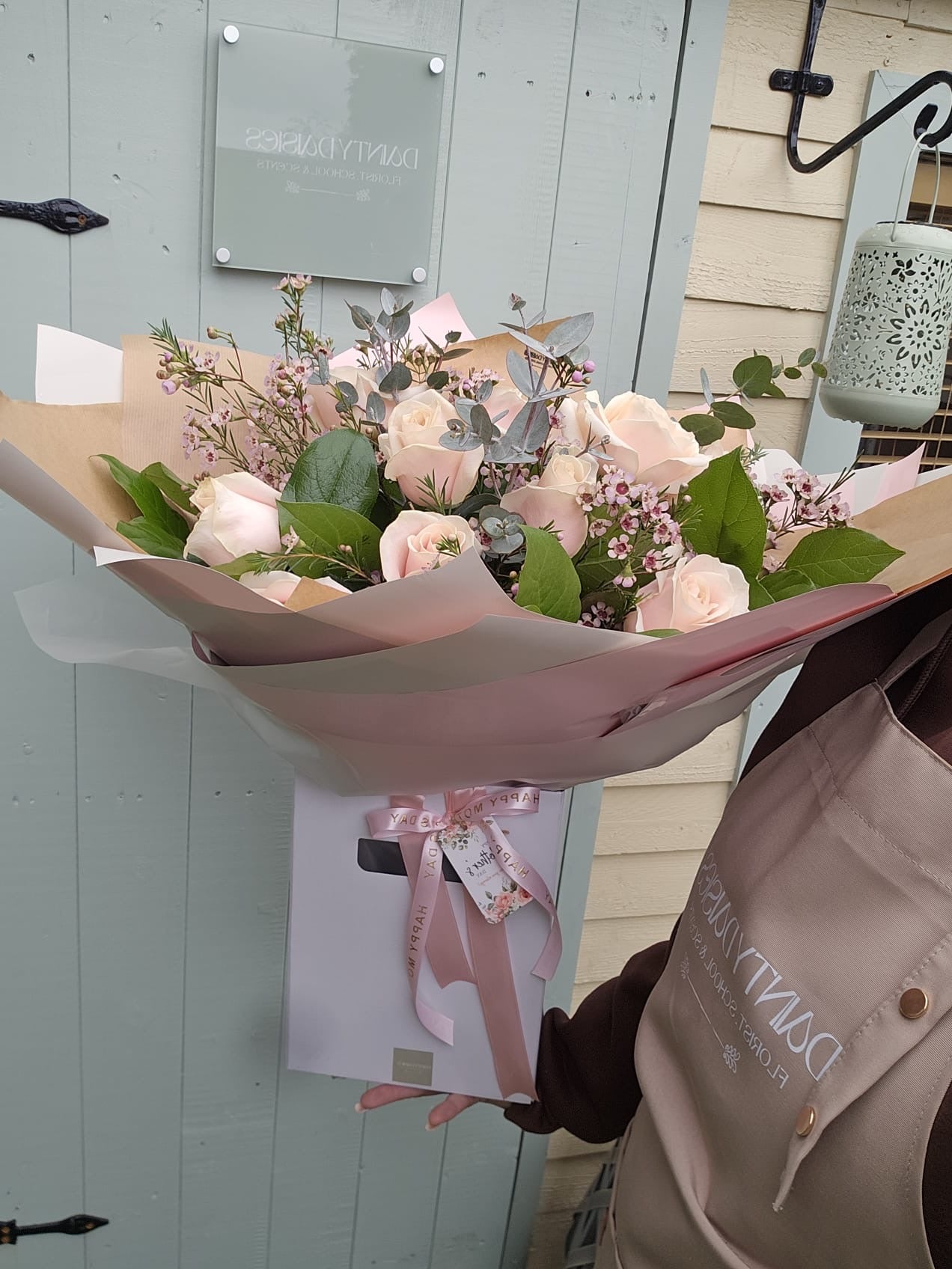 Rose and wax flower bouquet (all pink)